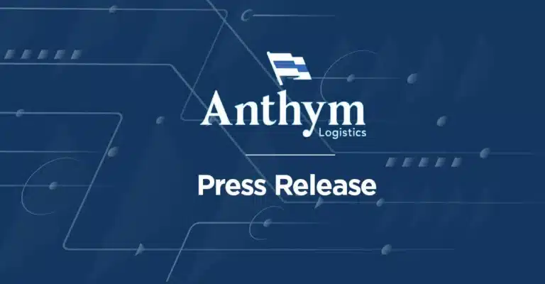 A digital press release graphic for Anthym Logistics, featuring their logo and white flag icon against a dark blue background with technical circuit-style design elements.