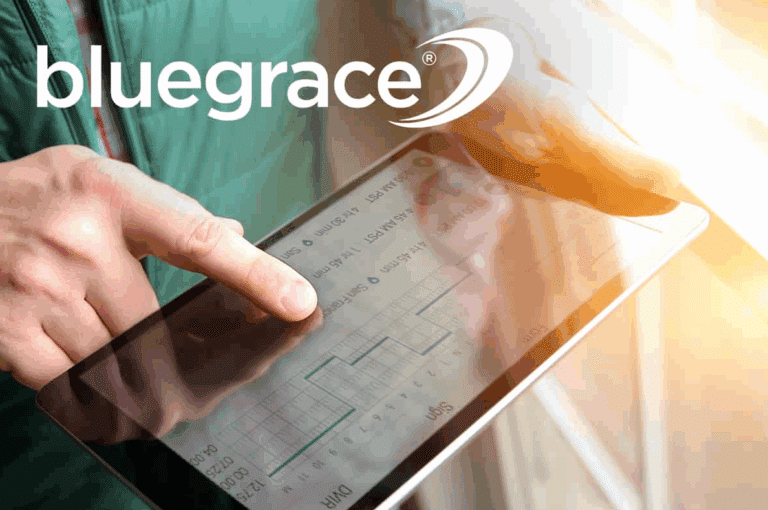 Close-up of hands using a digital tablet to review electronic driver logs and scheduling data.