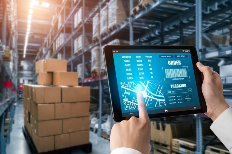What is a Freight Broker warehouse worker using tablet to track order