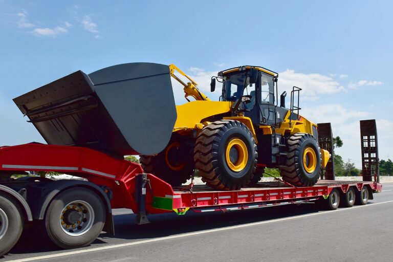 Shipping Heavy Haul and Oversize Loads bulldozer on flatbed trailer