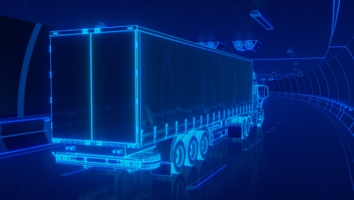 Full Truckload blue glowing semi trailer in a tunnel