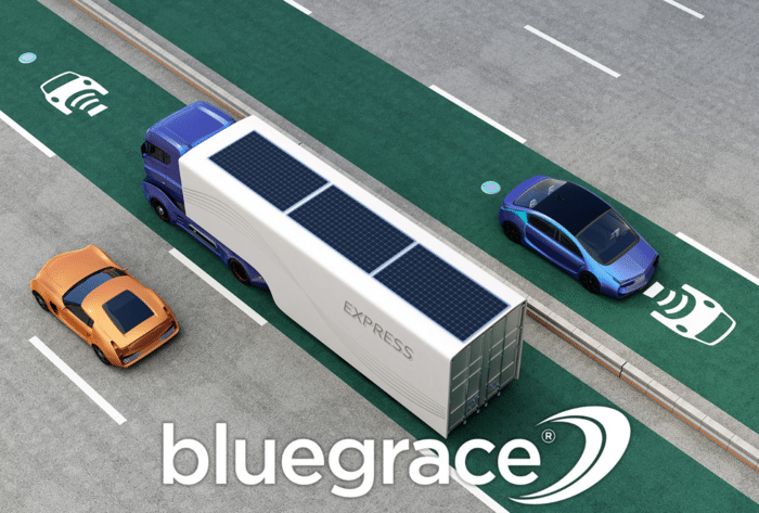 A 3D digital illustration of a futuristic white semi-truck with solar panels on its roof traveling in an "Express" lane, surrounded by smart vehicles and green sensor-equipped highway markers.