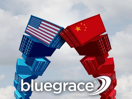 Stacks of shipping containers featuring USA and China flags leaning against each other, symbolizing international trade relations and freight logistics. Bluegrace logo at bottom.