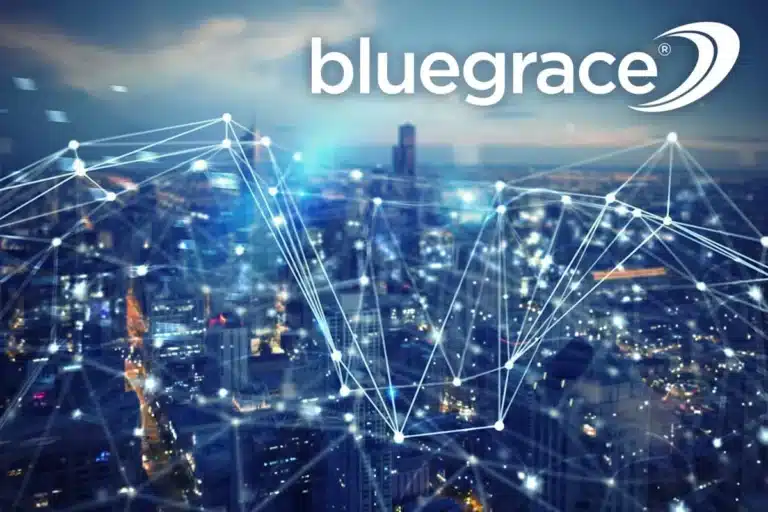 A conceptual digital graphic featuring a glowing, interconnected white network grid overlaid on a sprawling city skyline at dusk, with the BlueGrace logo in the top right corner.