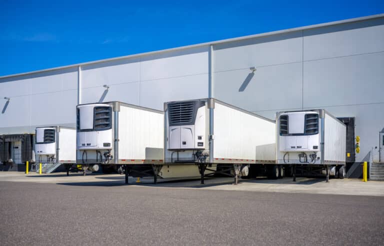 Temperature-Controlled Shipping reefer trailers at warehouse