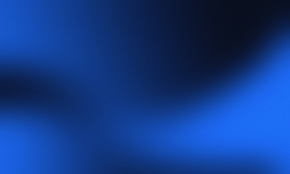 Abstract dark blue gradient background with a soft, grainy texture.