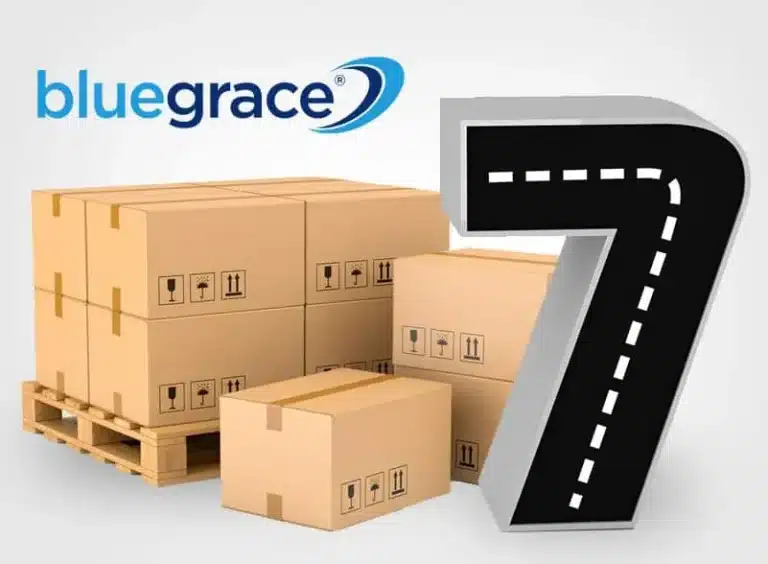 Pallet of boxes next to a large number seven styled as a road with the BlueGrace logo.