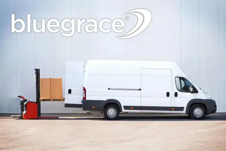 Electric forklift loading cardboard boxes into the back of a white delivery van with BlueGrace logo.