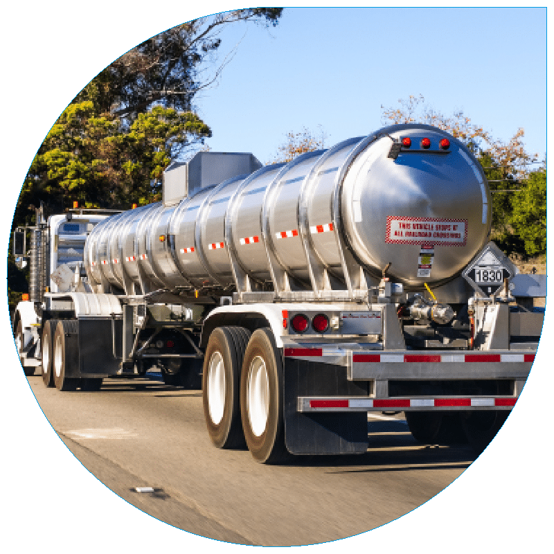 Silver tanker truck on highway