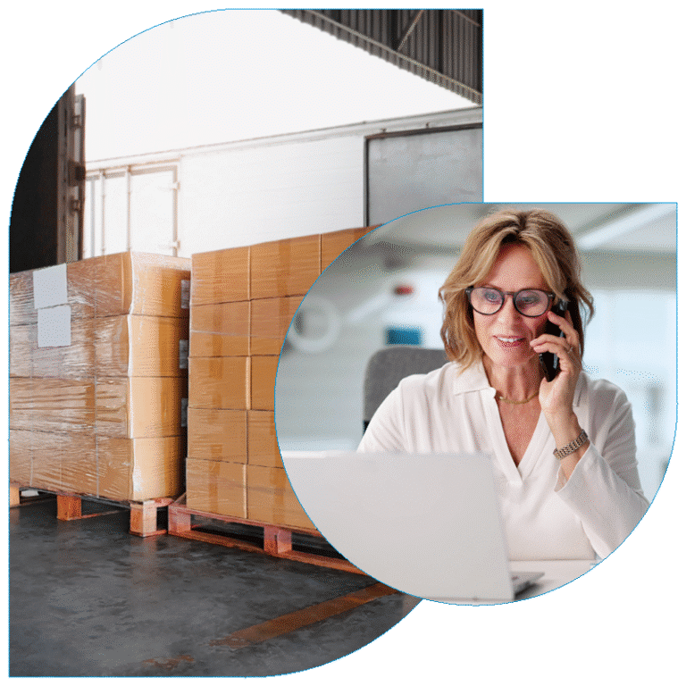 Composite image of stacked cardboard boxes on pallets at a loading dock next to a professional woman in glasses talking on a mobile phone while using a laptop.