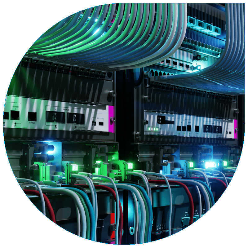 Close-up view of a high-performance server room featuring organized network cabling and glowing green status lights.