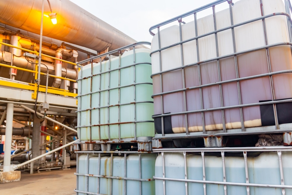 bulk containers store liquids at industrial facility