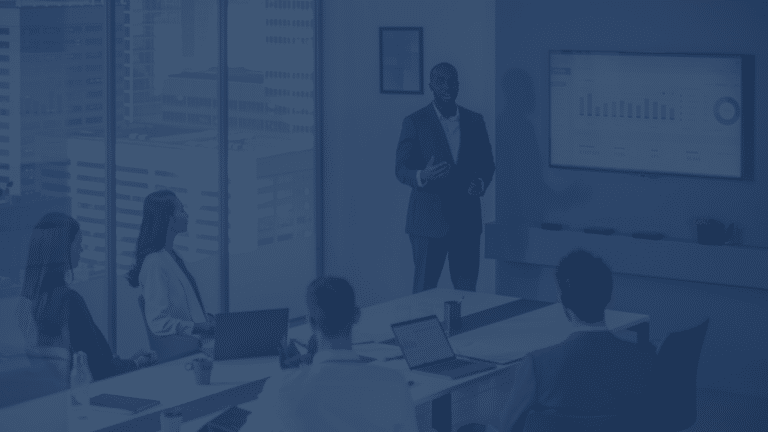 ecommerce logistics for private equity portfolio companies DARK employees in meeting room looking at stats and graphs